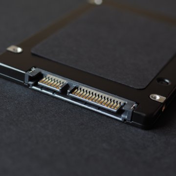 End of a hard drive on a felt desk